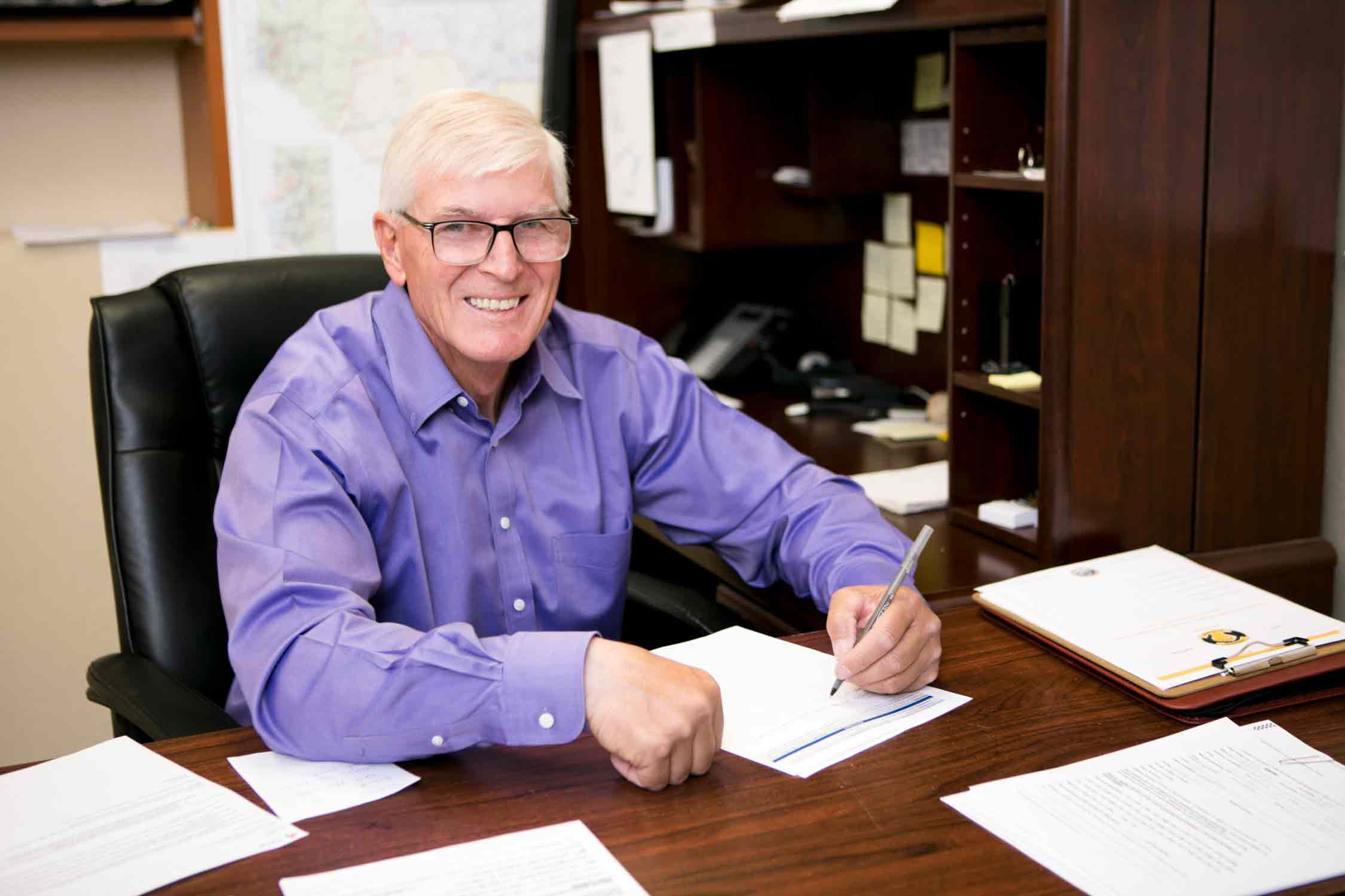 Skip Daly Working at his desk for Senate District 13.